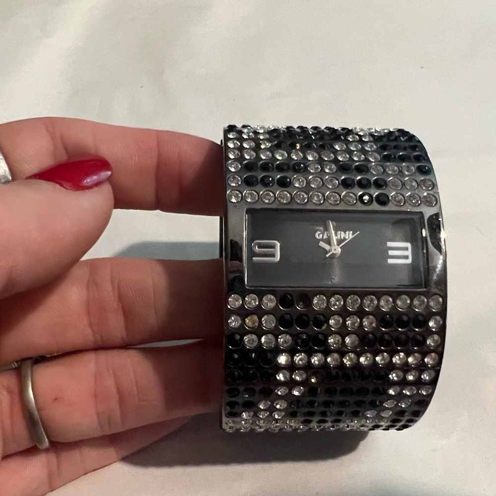 Galini, One of a kind multi-tone black wrist watch with crystal bedazzling.